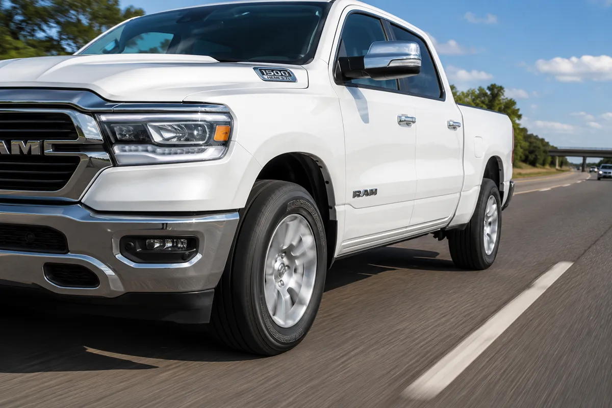 Ram 1500 fitted with Atturo Trail Blade H/T highway terrain tires on the interstate